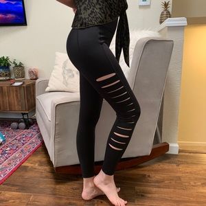 Cut the Frills black leggings with side slits